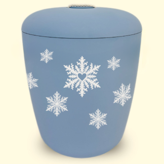 Sininen uuurna jossa lumihiutaleet